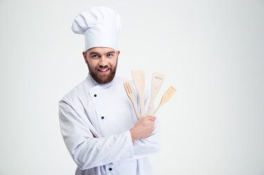 Adam aşçı holding kaşık gülümseyen