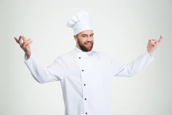 Happy chef cook showing welcome gesture — Stock Photo, Image