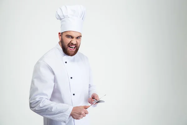 Λειαντικές μαχαίρι μάγειρας αρσενικό σεφ — Φωτογραφία Αρχείου