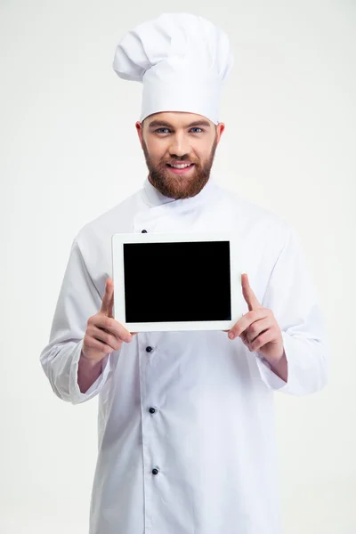 Cozinheiro chef masculino mostrando tela de computador tablet em branco — Fotografia de Stock