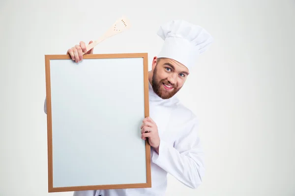 Chef cuisinier tenant tableau blanc — Photo