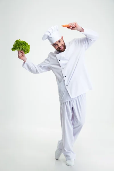 Gelukkig man dansen met groenten — Stockfoto