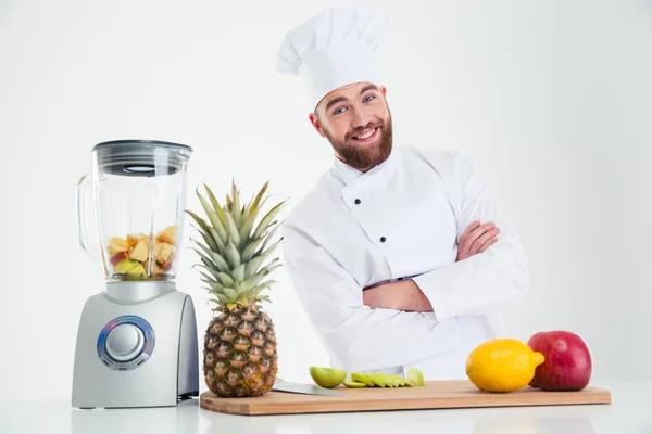 Glada kocken cook står med armarna vikta — Stockfoto