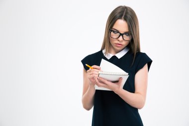 Kız öğrenci onun not defteri arıyorsunuz