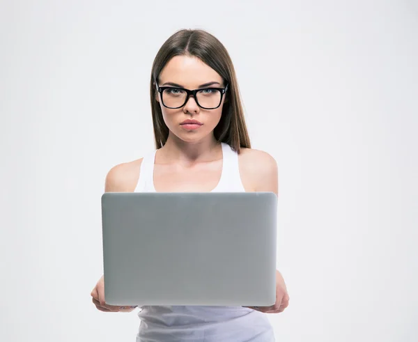 Female student standing with laptop — Stock Photo, Image