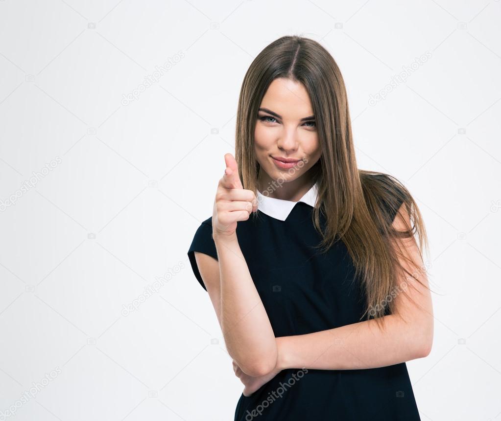 Happy woman pointing finger at camera
