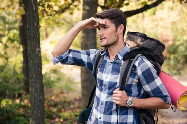 Portrait of a man with marching backpack — Stock Photo, Image