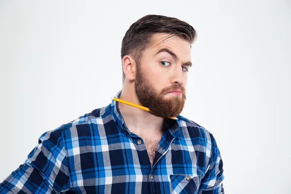 Człowiek z ołówkiem w brodę — Zdjęcie stockowe