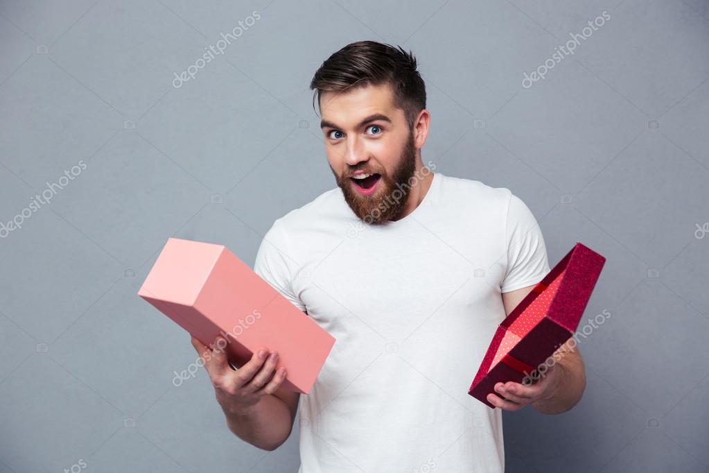 Man opening gift box