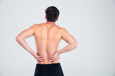 Sırt ağrısı olan fitness adam