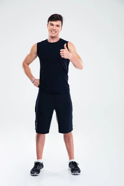 Happy fitness man showing thumb up — Stock Photo, Image