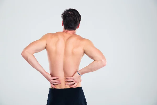 Fitness man having back pain — Stock Photo, Image