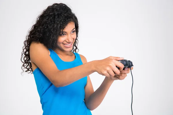 Afro americano mujer jugando video juego con joystick —  Fotos de Stock