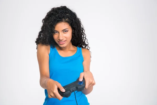 Afro americano mujer jugando video juego con joystick —  Fotos de Stock