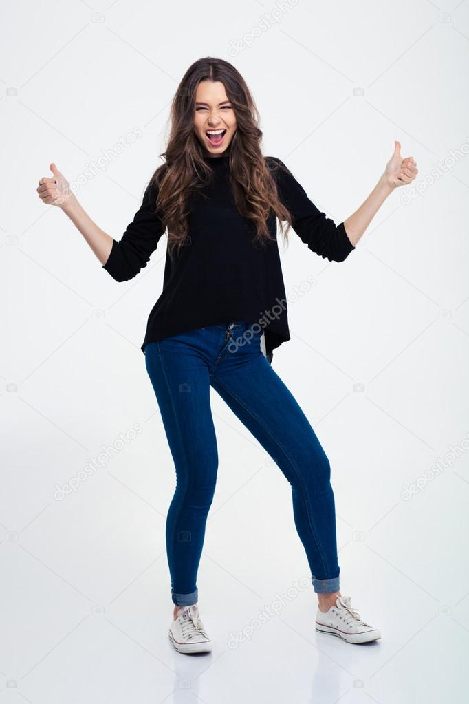 Cheerful casual woman showing thumbs
