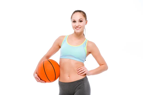 Jovem desportista segurando bola de basquete — Fotografia de Stock