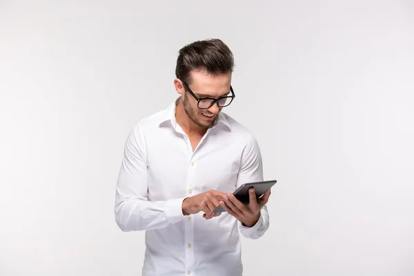 Happy businessman using tablet computer — Stock Photo, Image