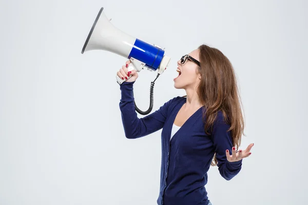 Beautiful woman shouting in loudspeaker — Stock Photo, Image