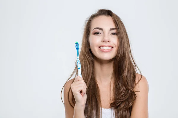 Χαριτωμένο γυναίκα εκμετάλλευση οδοντόβουρτσα — Φωτογραφία Αρχείου