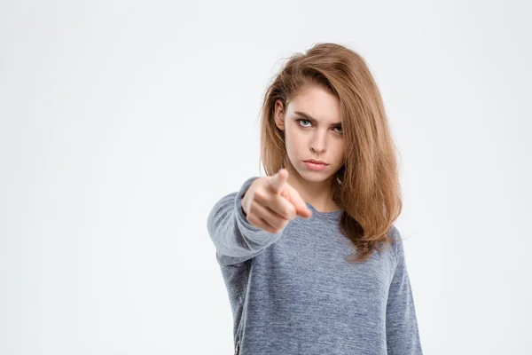 Angry woman pointing finger at camera — Stock Photo, Image