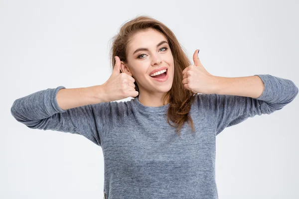 Riendo mujer mostrando pulgares hacia arriba —  Fotos de Stock