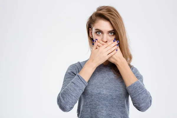 Woman covering her mouth with palms — Stock Photo, Image