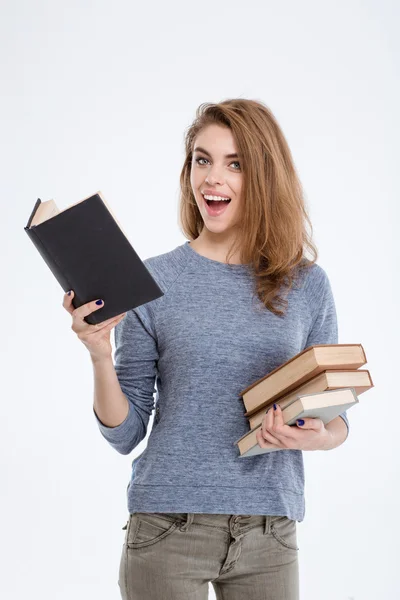 Mujer alegre sosteniendo libros — Foto de Stock