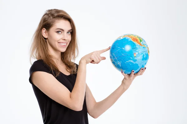Donna che punta il dito sul globo mondiale — Foto Stock