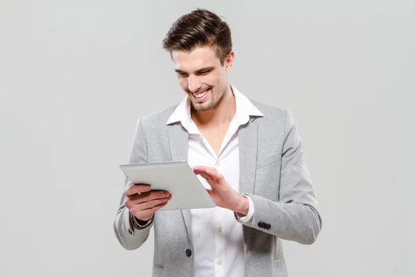 Boldog fiatal srác segítségével tabletta — Stock Fotó