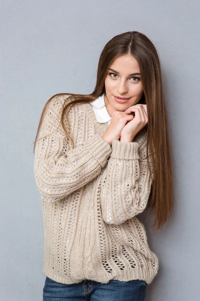 Portrait of young beautiful girl in knitted sweater — Stock Photo, Image