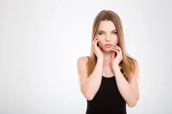 Sensual pretty young female touching her face — Zdjęcie stockowe