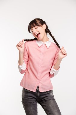 Cheerful female teenager singing