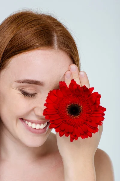 Beauty portrait of a smiling woman with flower — Stock Photo, Image