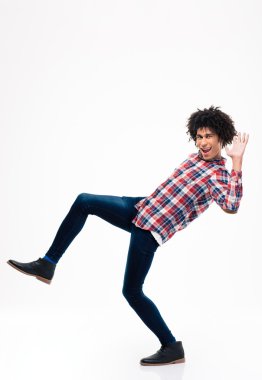 Full length portrait of afro american man falling