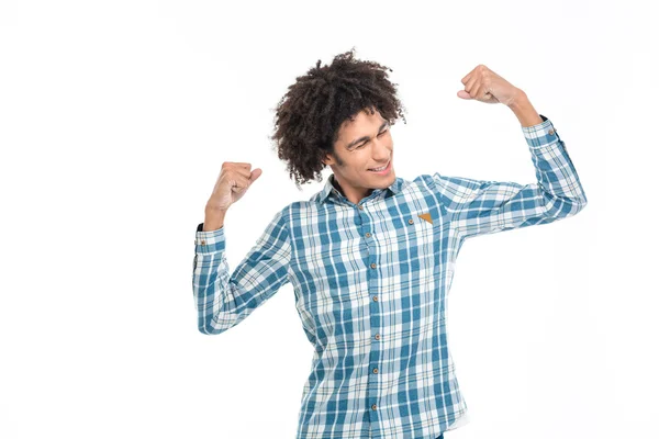 Afro american man showing his biceps — Stock Photo, Image