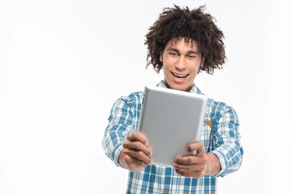 Cheerful afro american man using tablet computer — Stock Fotó
