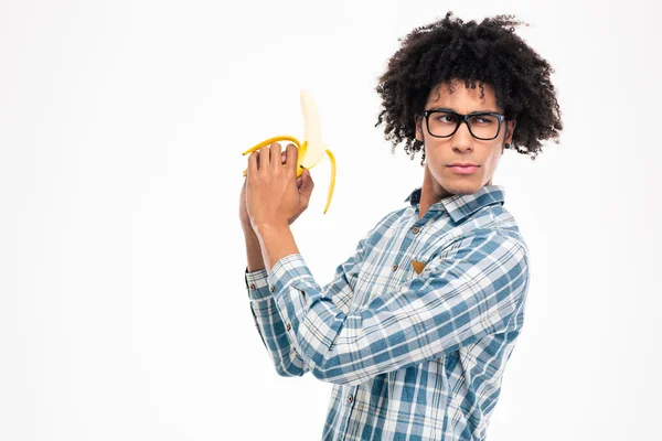 Funny afro american man holding banana — Φωτογραφία Αρχείου
