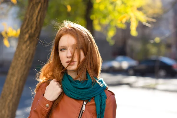 Beautiful redhead female in the street — Stock Fotó