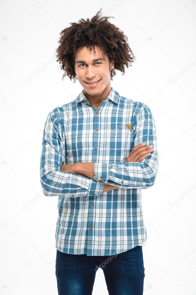 Afro american man standing with arms folded