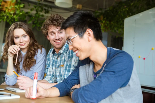 Asian guy feels embarrassed and shy with his friends — Stock Photo, Image