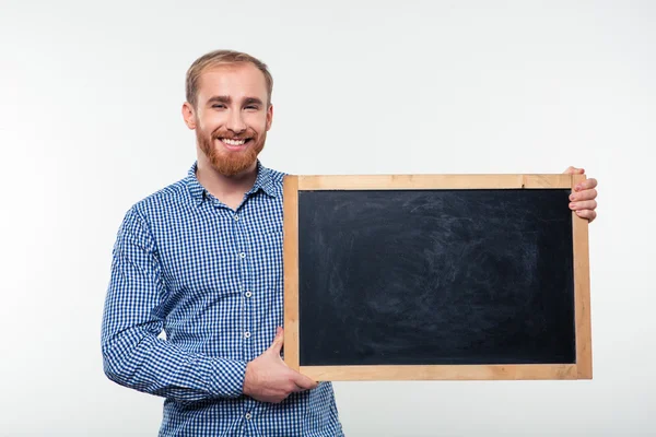 Happy man holding blank board — Stock Photo, Image