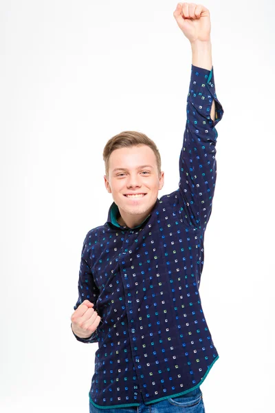 Exited cheerful successful man raised hand up gesturing victory — Stock Photo, Image