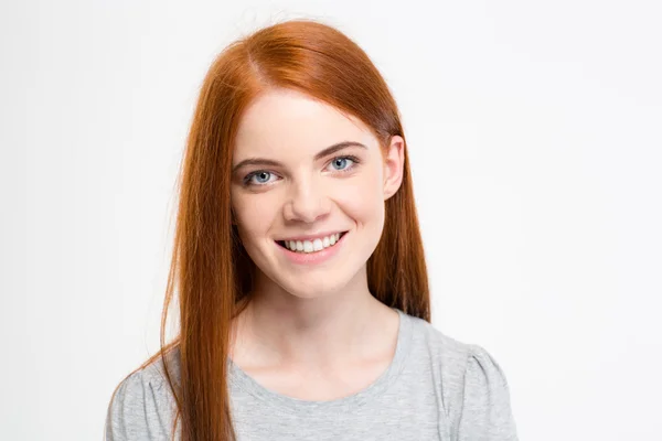 Portrait of positive cheerful young female with long red hair — Stockfoto