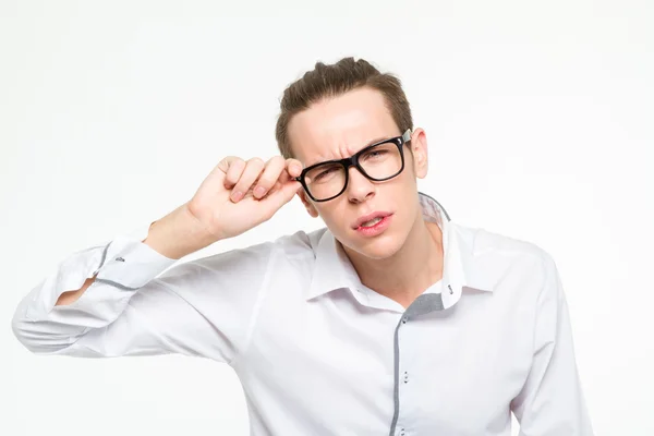 Zakenman in glazen camera kijken — Stockfoto