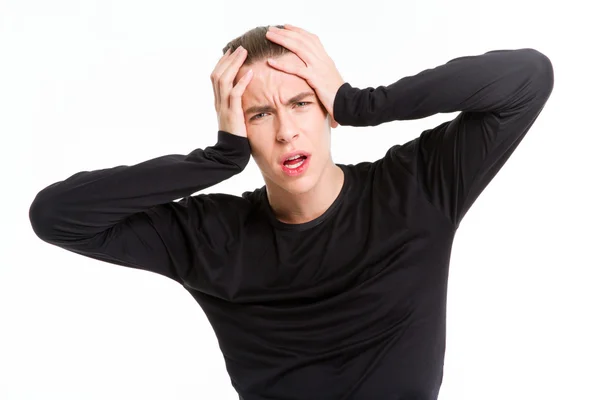 Portrait d'un homme stressé touchant la tête — Photo