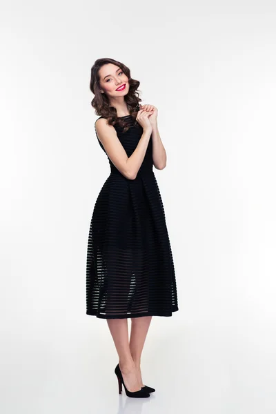 Comprimento total de alegre retro estilo feminino em vestido preto — Fotografia de Stock