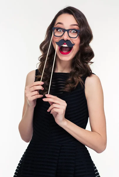 Funny cheerful woman having fun using glasses and moustache props — Stok fotoğraf