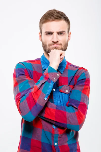 Thoughtful casual man looking at camera — ストック写真