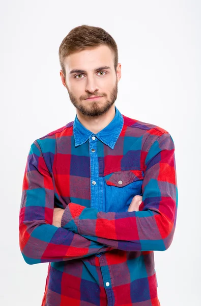 Serious casual man standing with arms folded — Stok fotoğraf