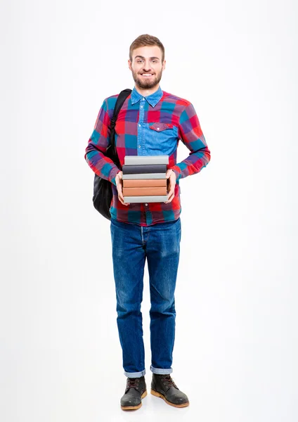Ganzkörperporträt eines glücklichen Mannes mit Büchern — Stockfoto